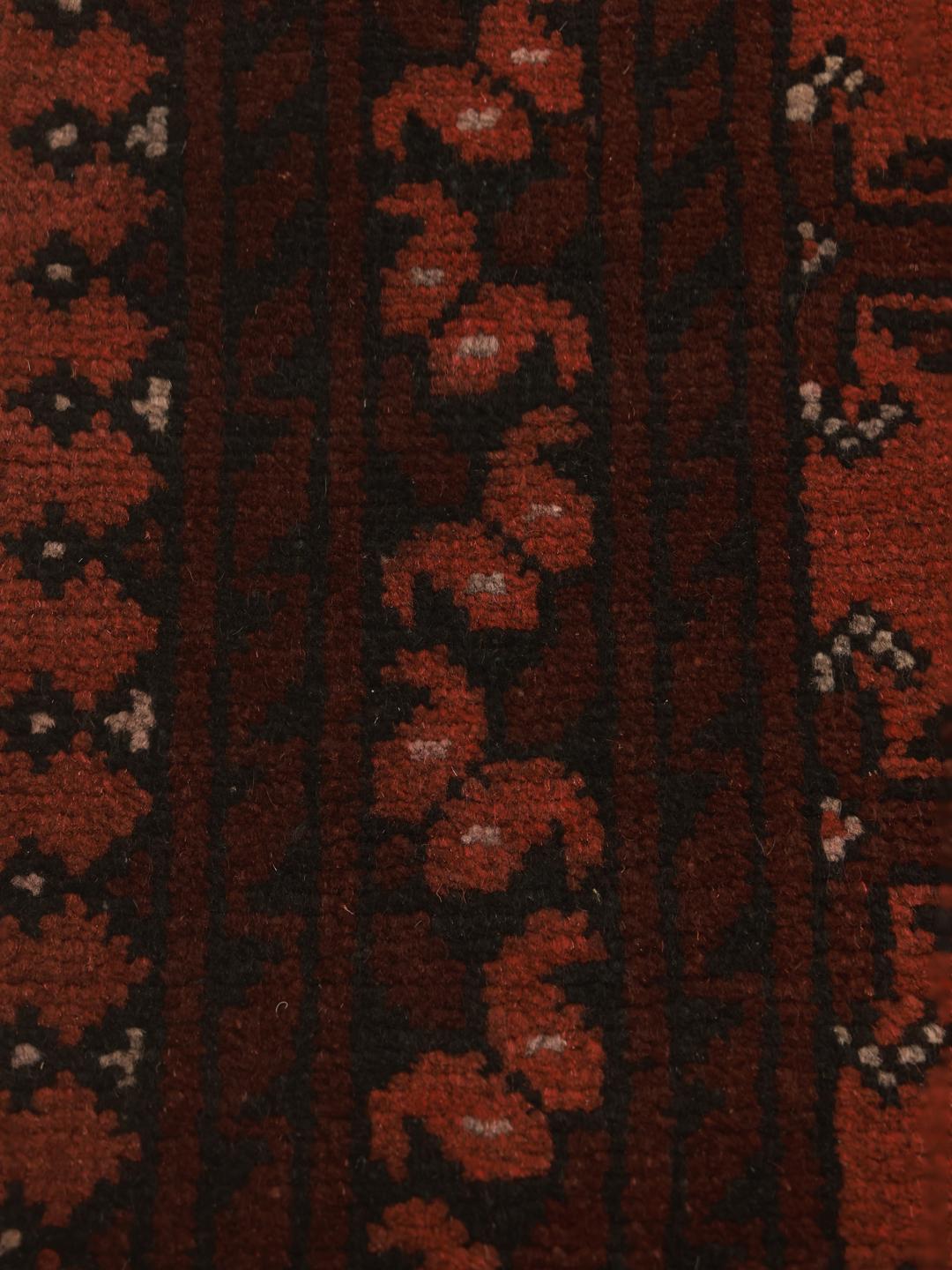 Hand-knotted Afghan Fine runner rug in dark-red and black