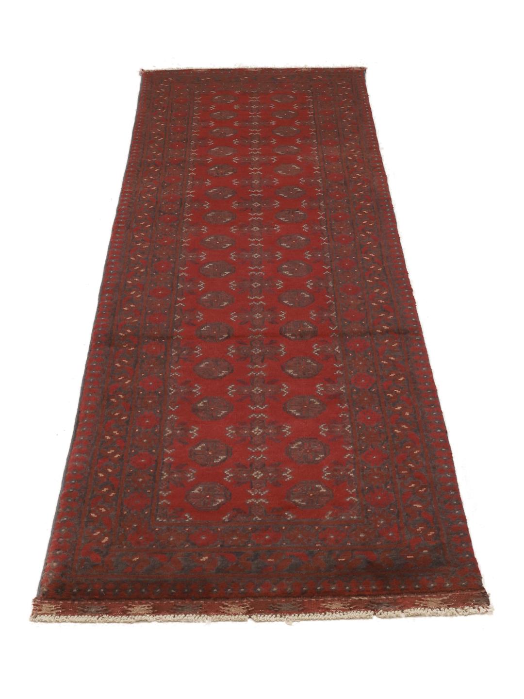 Hand-knotted Afghan runner in dark-red wool