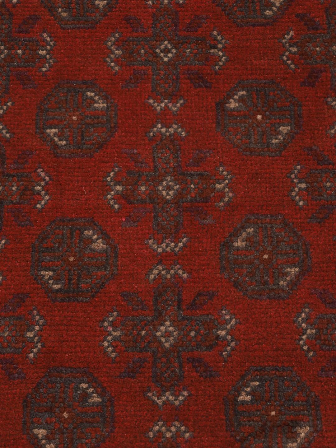 Hand-knotted Afghan runner in dark-red wool