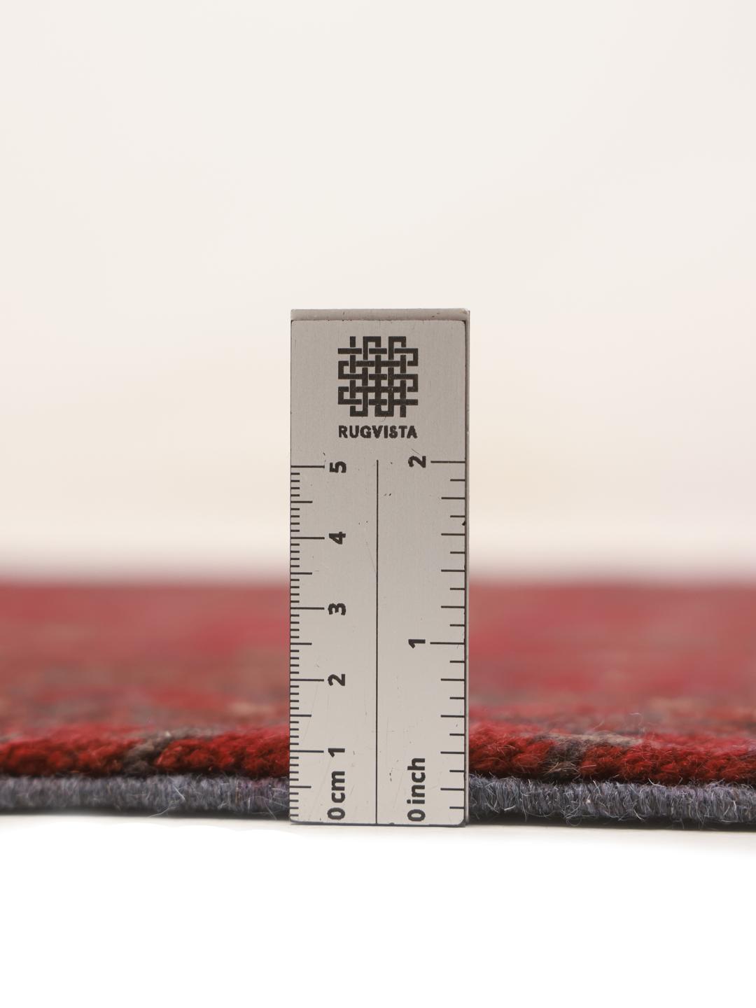 Hand-knotted Afghan runner in dark-red wool