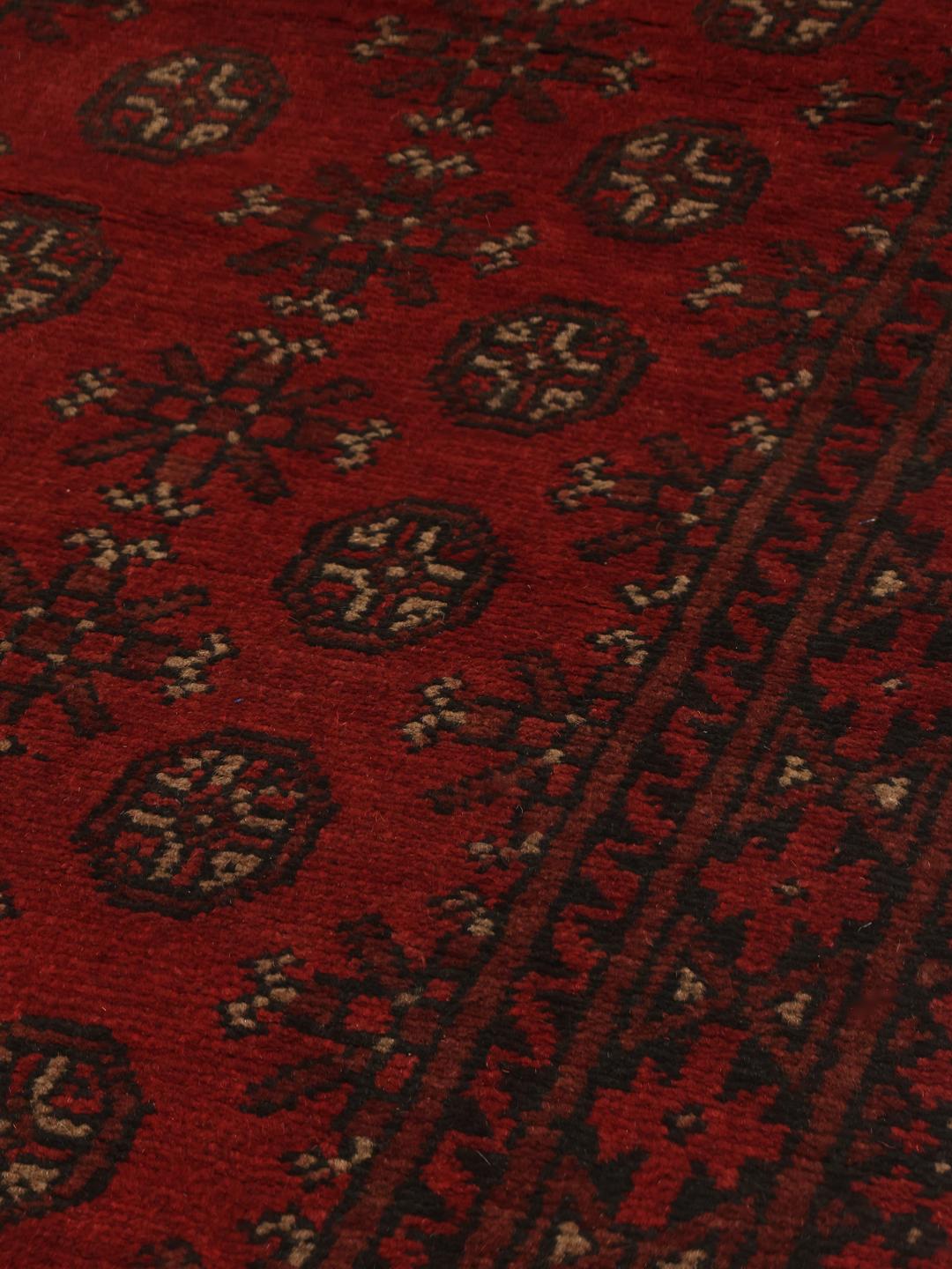 Hand-knotted Afghan runner rug in dark-red and dark-grey