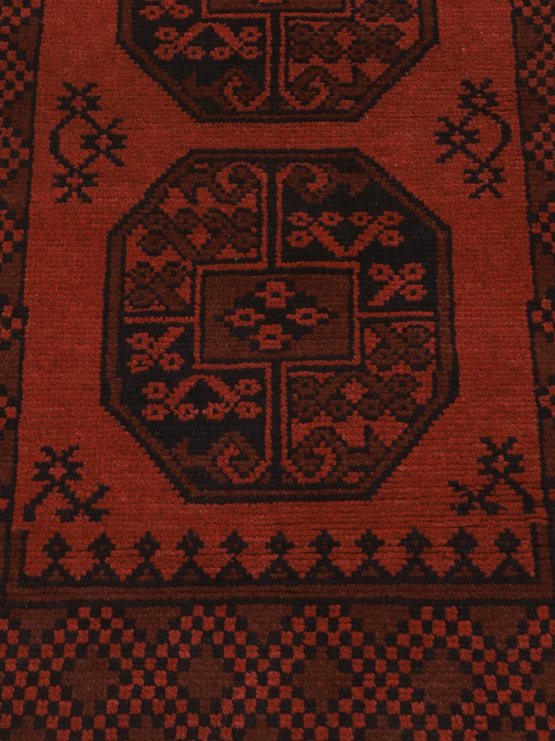 Hand-knotted dark-red runner rug from Afghanistan