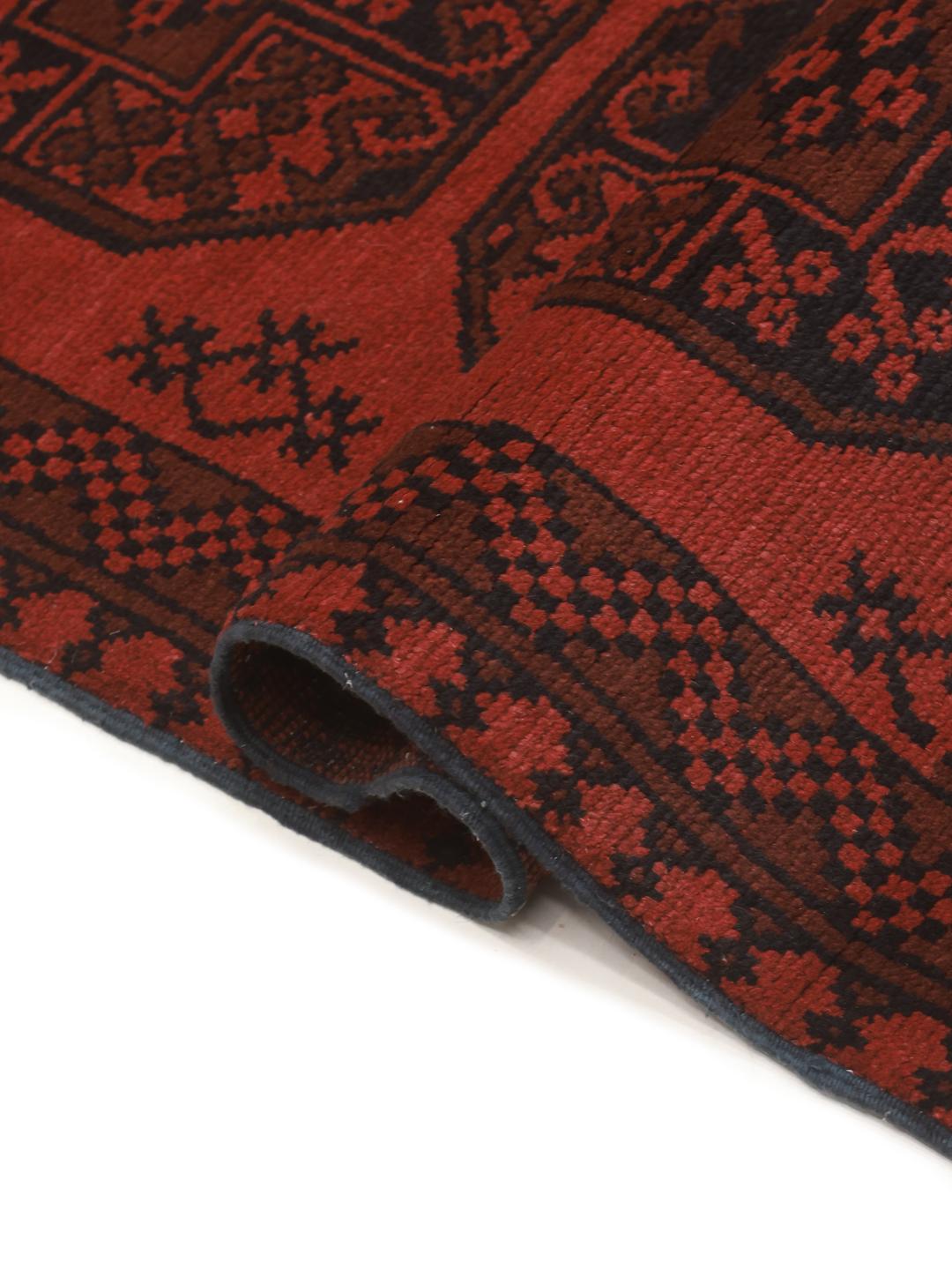 Hand-knotted dark-red runner rug from Afghanistan