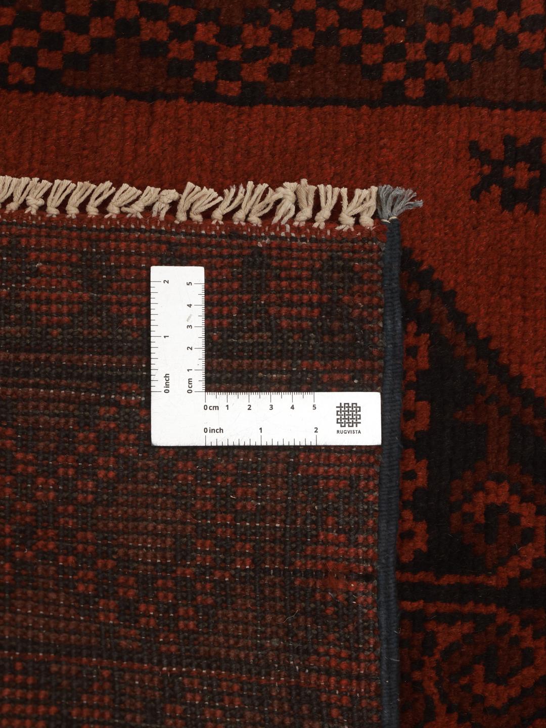 Hand-knotted dark-red runner rug from Afghanistan