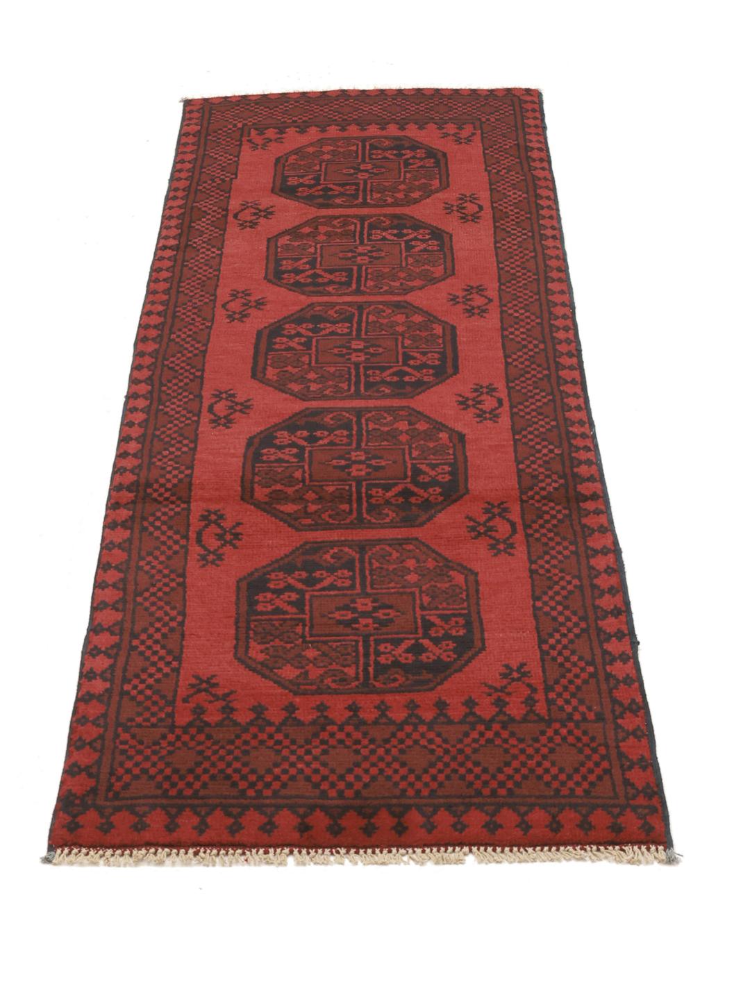 Hand-knotted dark-red runner rug from Afghanistan