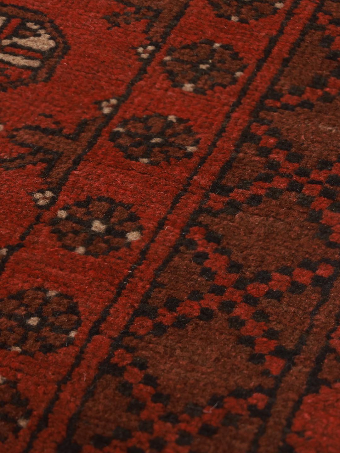 Hand-knotted runner rug from Afghanistan in dark-red and black