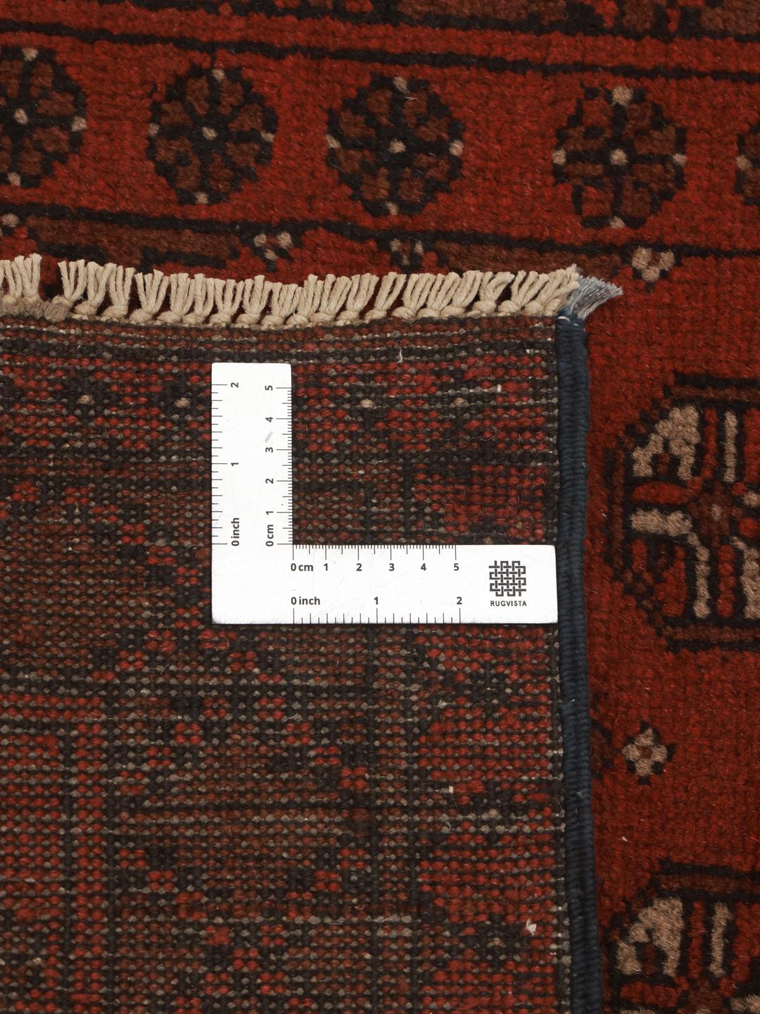 Hand-knotted runner rug from Afghanistan in dark-red and black