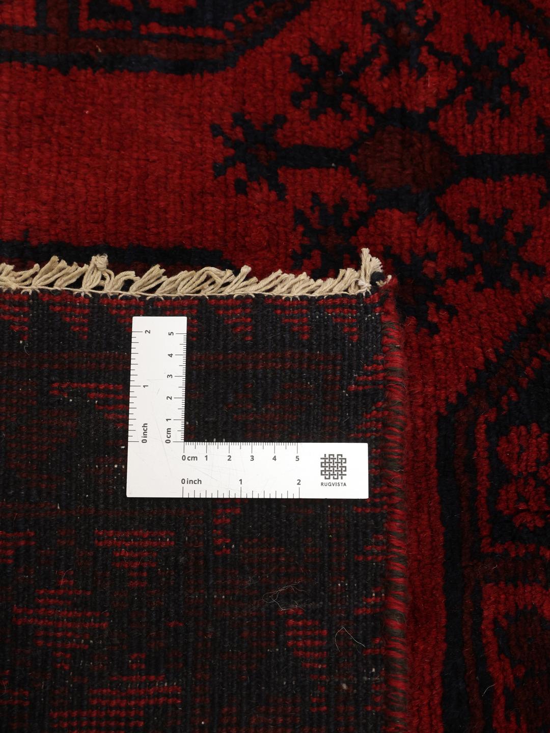 Met de hand geknoopt wollen vloerkleed uit Afghanistan in donkerrood en zwart