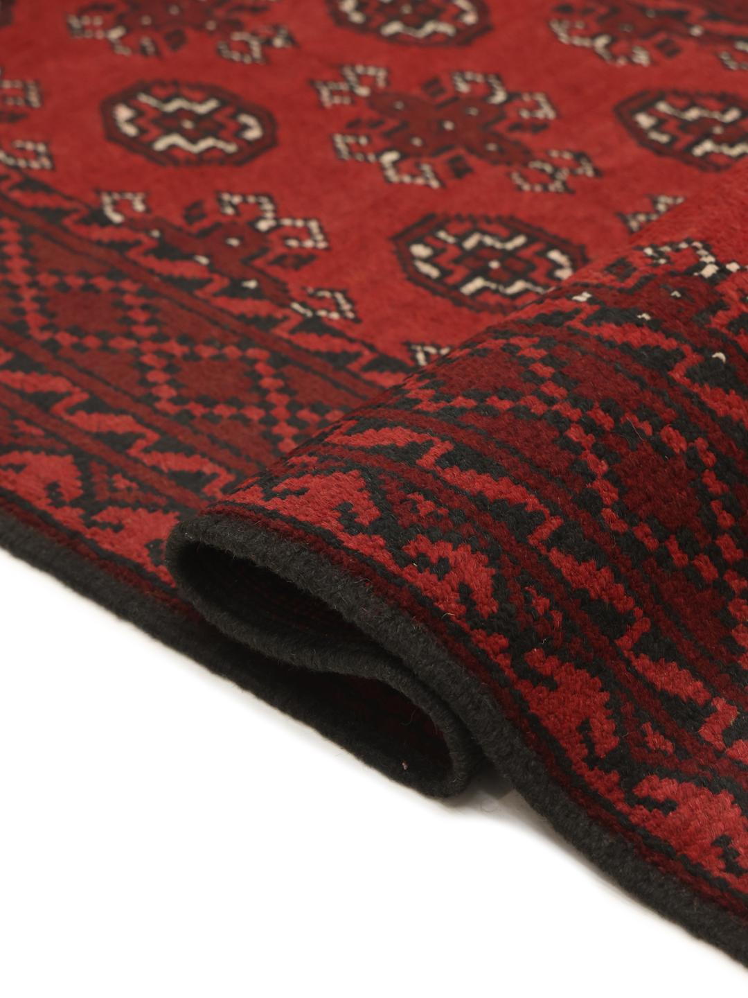 Tapis couloir noué à la main en provenance d'Afghanistan en rouge foncé et noir