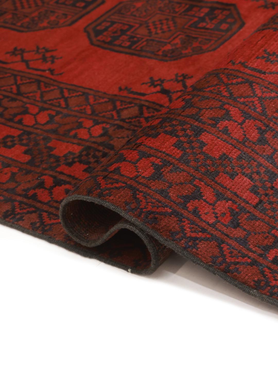 Hand-knotted wool rug from Afghanistan in dark-red and black