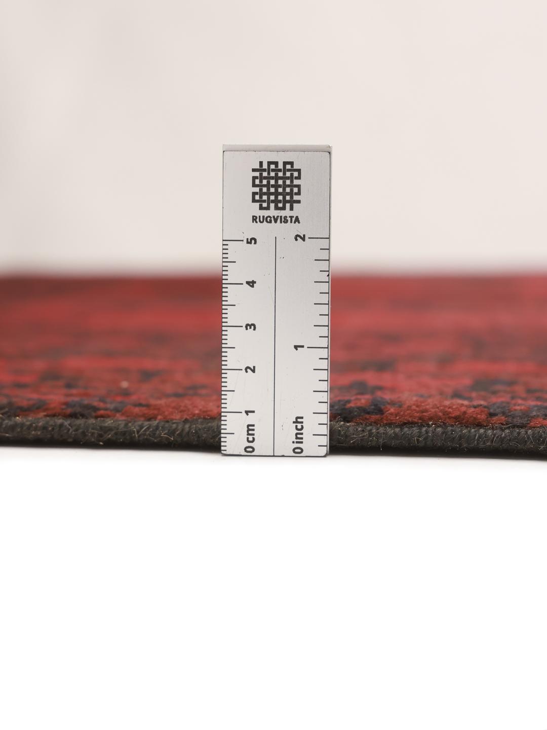 Hand-knotted wool rug from Afghanistan in dark-red and black