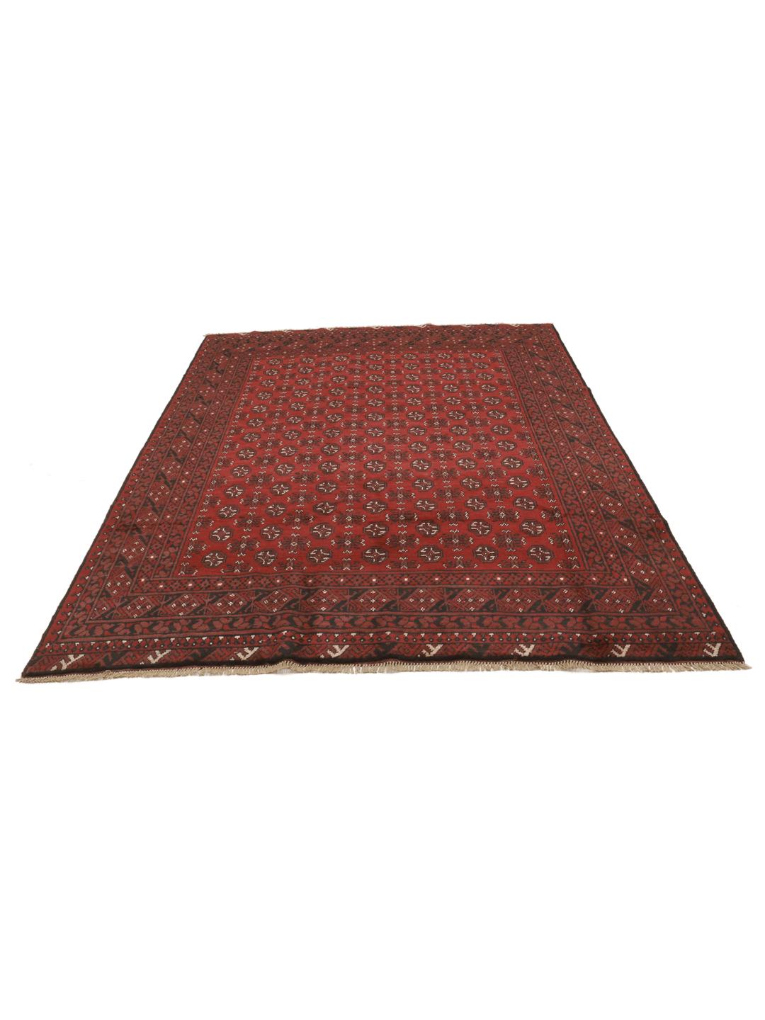 Rug originating from Afghanistan in dark-red