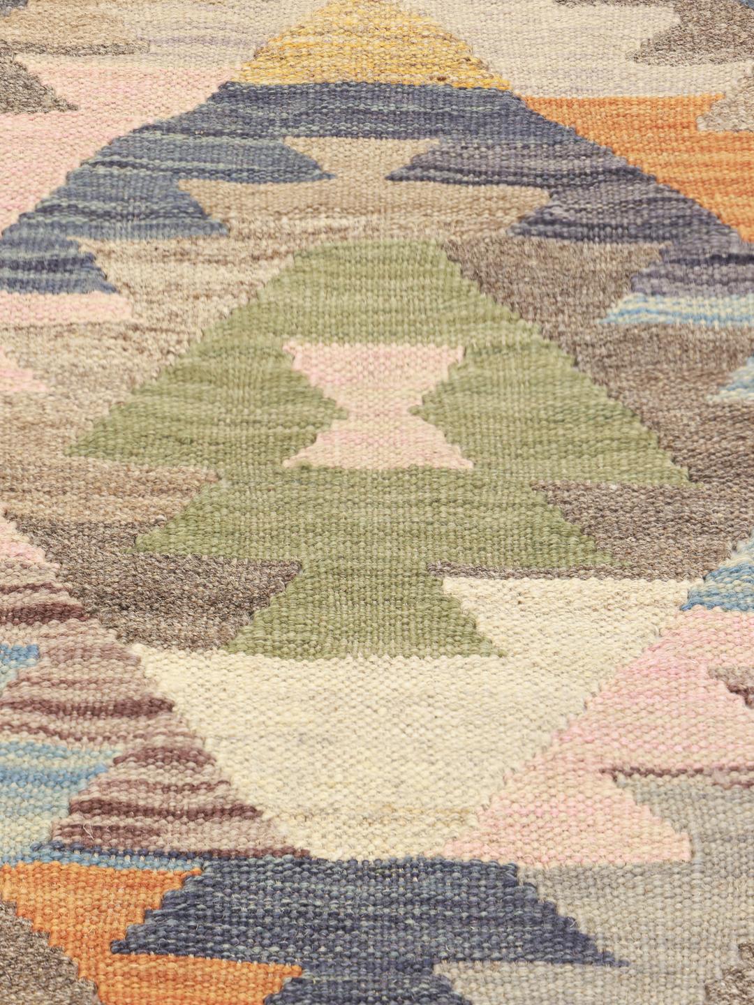 Rug from Afghanistan in beige featuring a diamond pattern