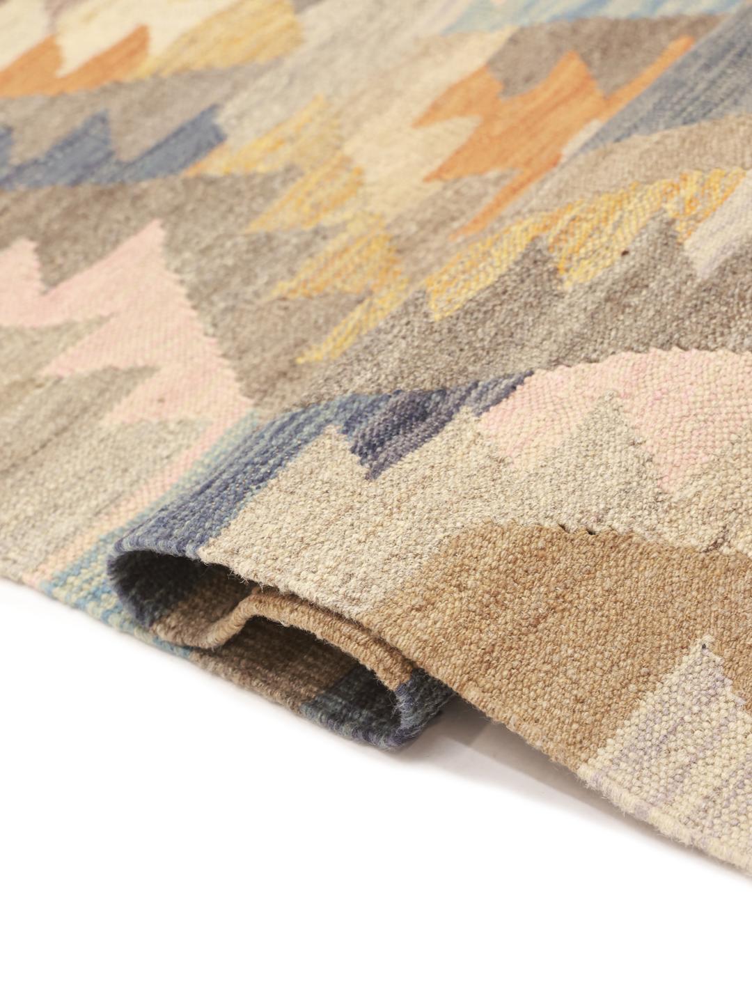 Rug from Afghanistan in beige featuring a diamond pattern