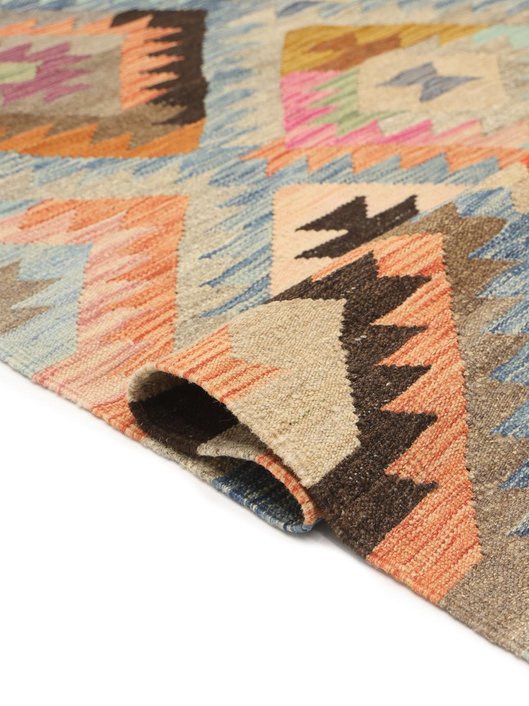 Handmade Afghan rug in multicolor with diamond patterns