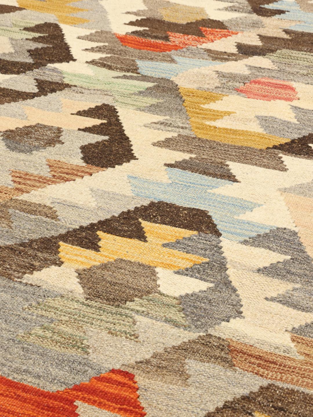 Handwoven geometric kilim rug in beige and multicolor wool from Afghanistan