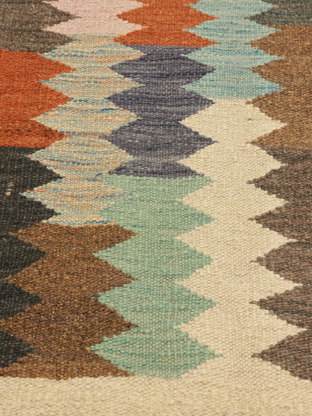 Hand-woven multicolor wool rug from Afghanistan