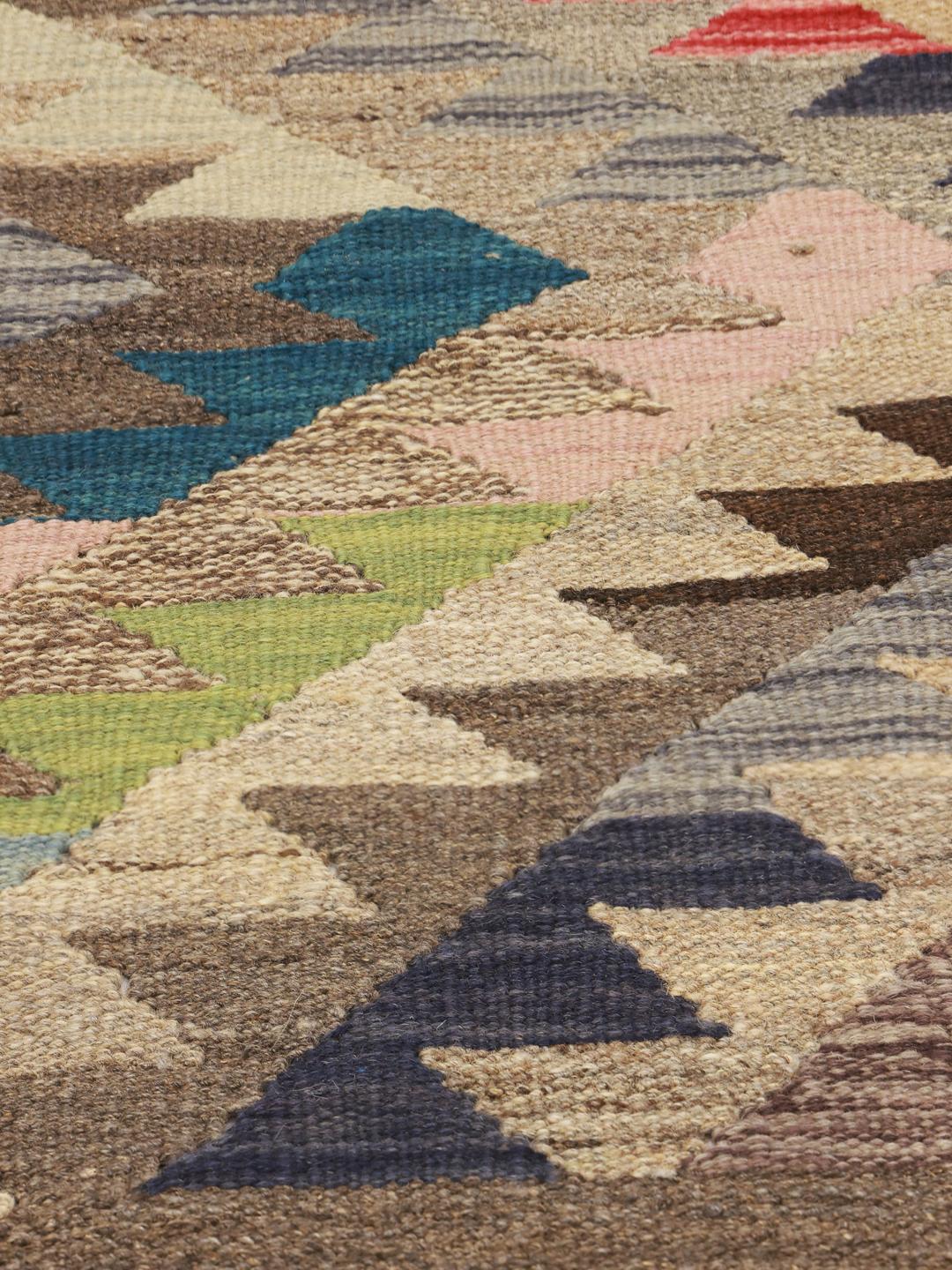 Handwoven multicolor wool rug from Afghanistan