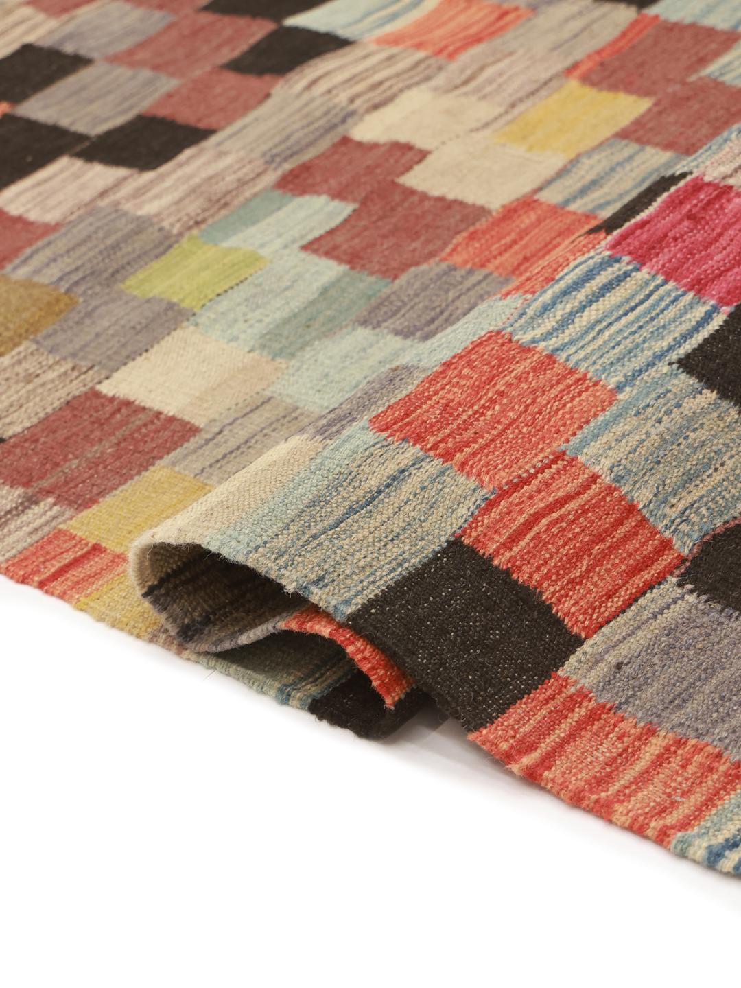 Handwoven multicolor wool rug from Afghanistan with a checkered pattern