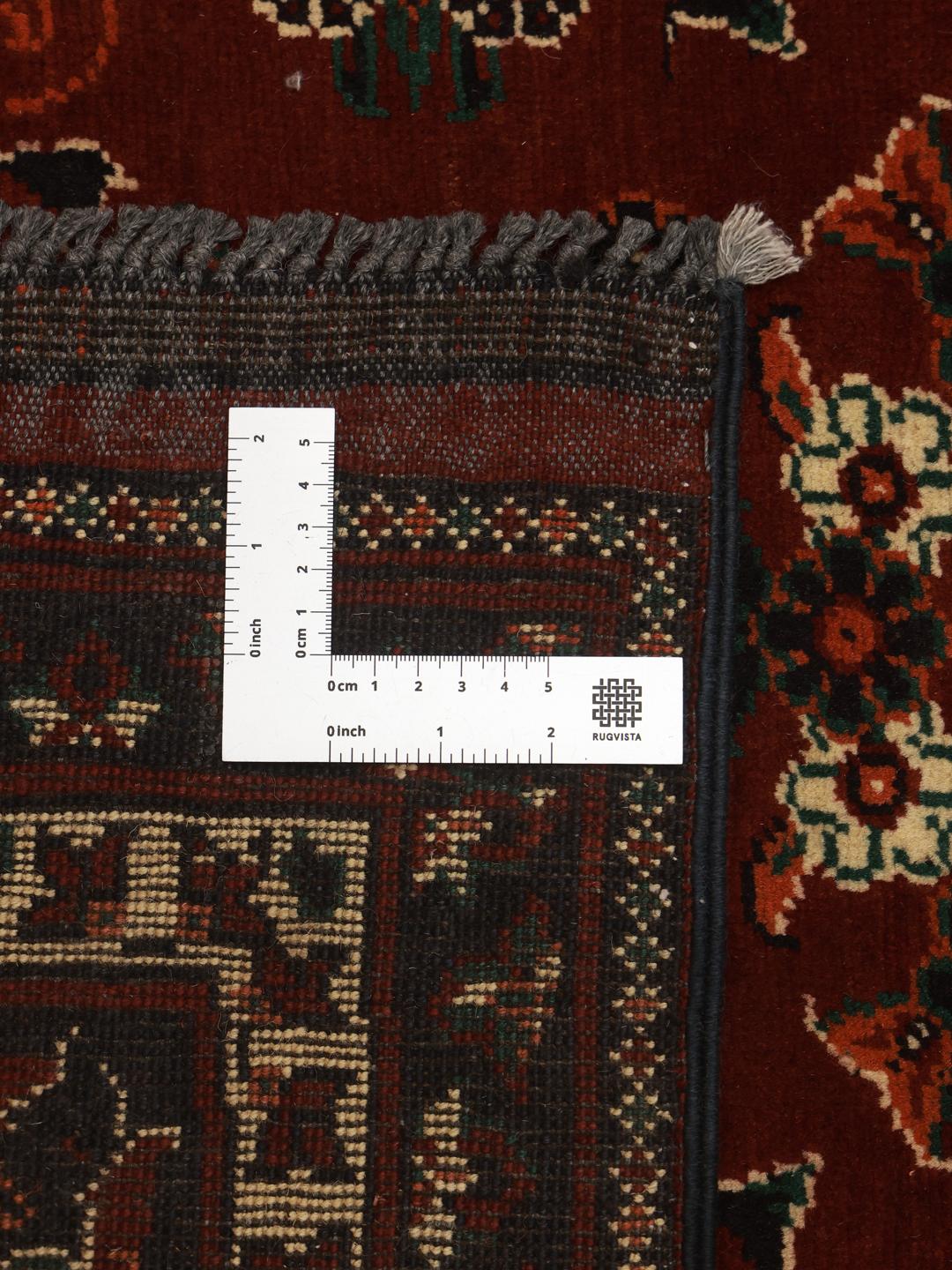 Hand-knotted Kunduz wool rug in dark-red from Afghanistan