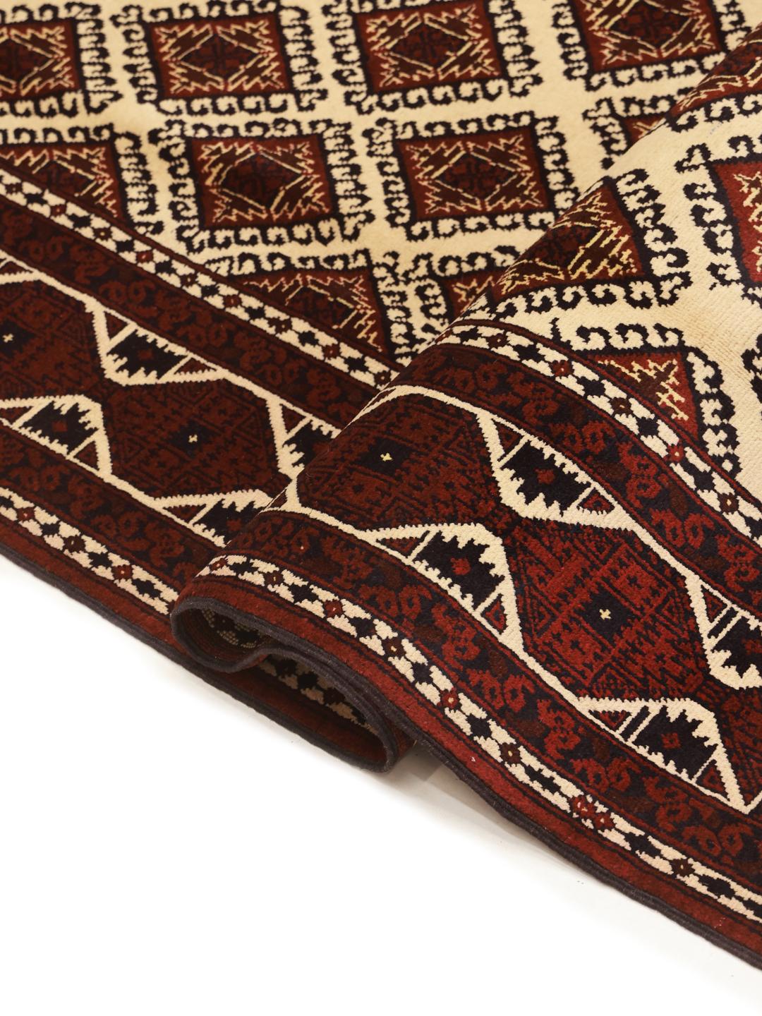 Hand-knotted Kunduz wool rug in dark-red and beige from Afghanistan