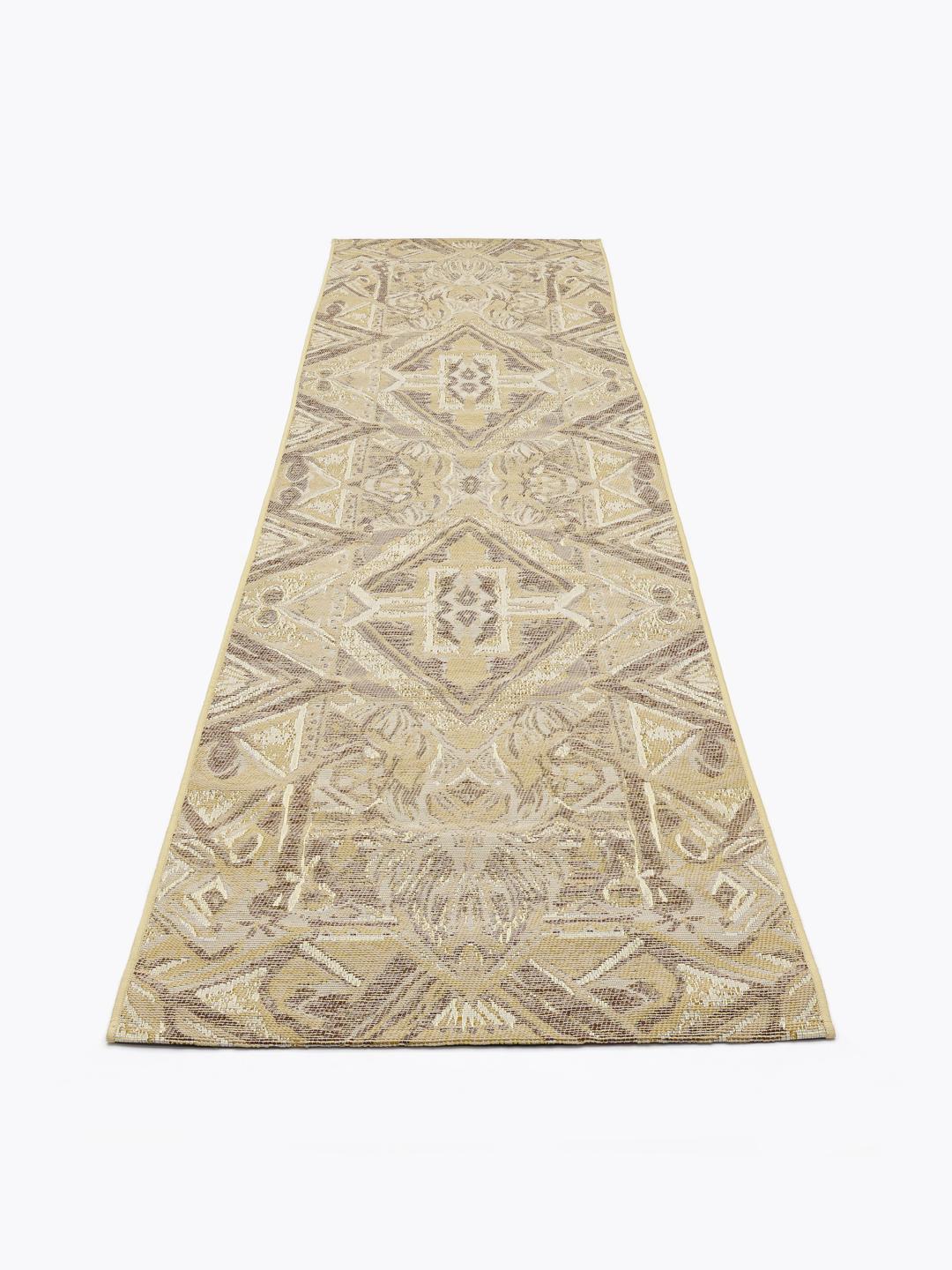 Beige loper met geometrische ruitpatronen