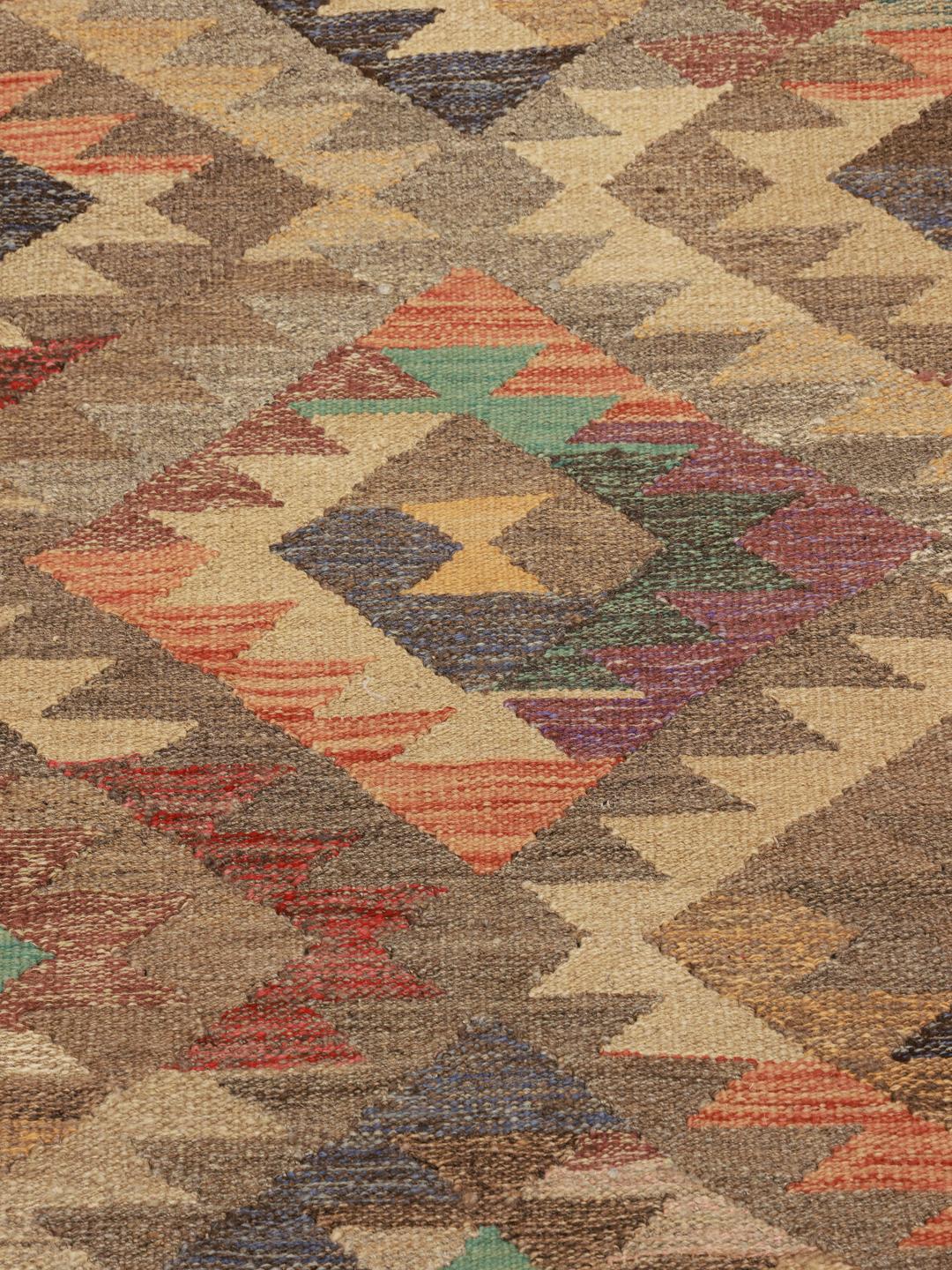 Handgeweven beige wollen loper uit Afghanistan