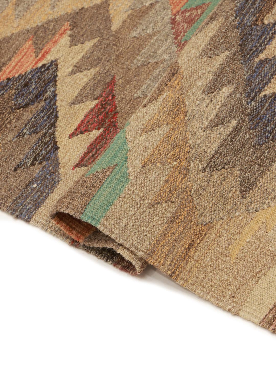 Handgeweven beige wollen loper uit Afghanistan
