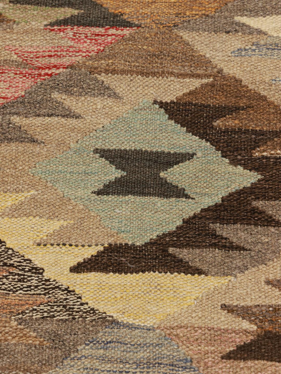 Handgeweven wollen loper uit Afghanistan in beige en bruine geometrische patronen