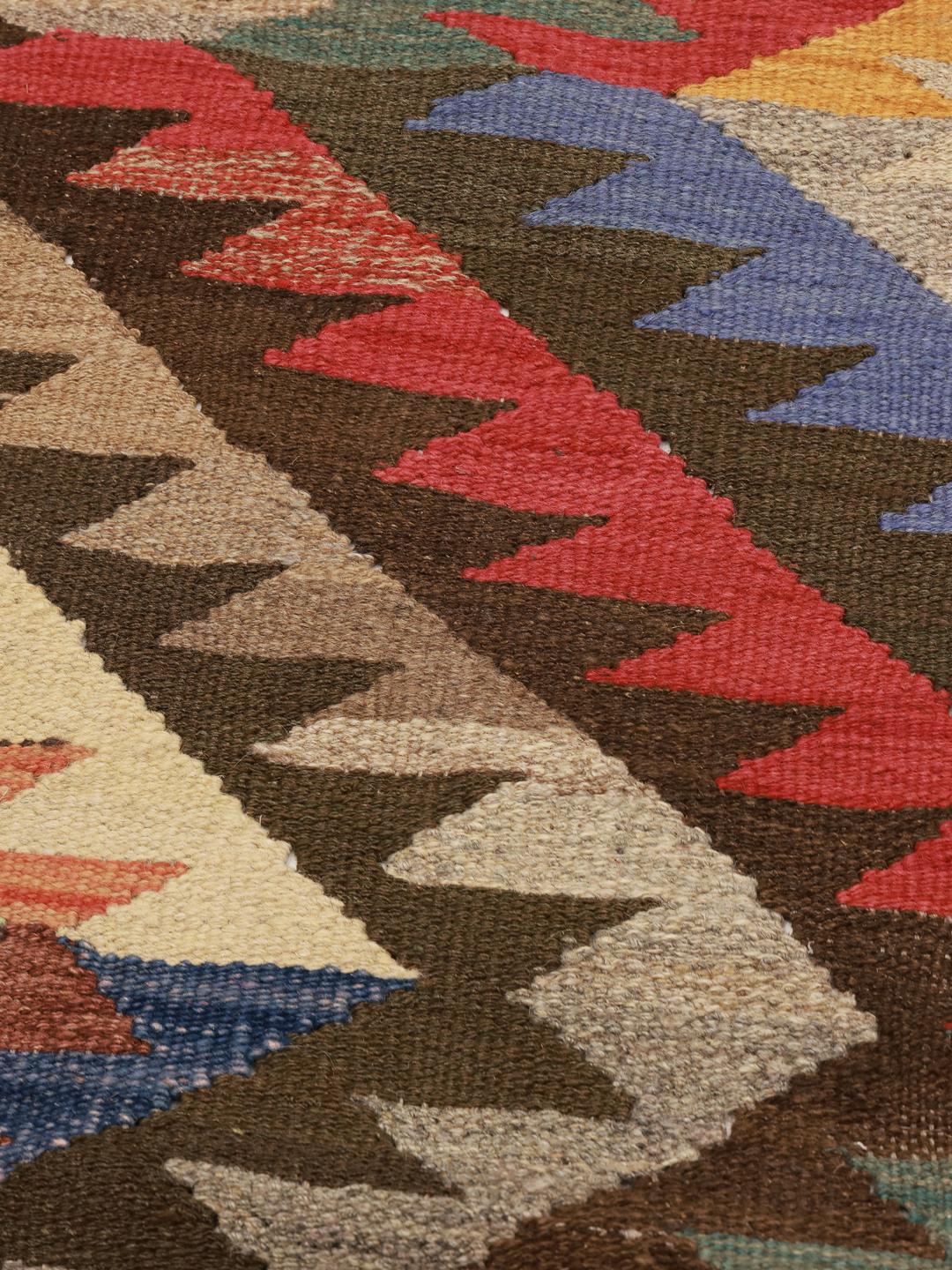Hand-woven multicolor wool runner rug from Afghanistan with geometric patterns