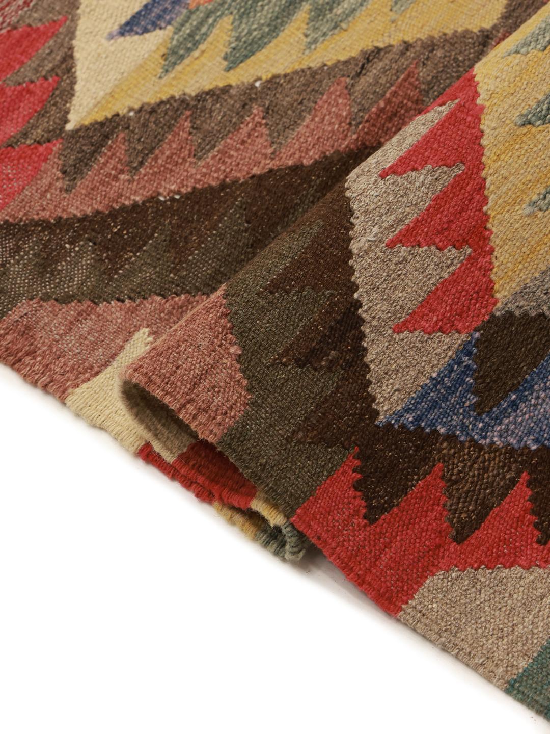 Hand-woven multicolor wool runner rug from Afghanistan with geometric patterns
