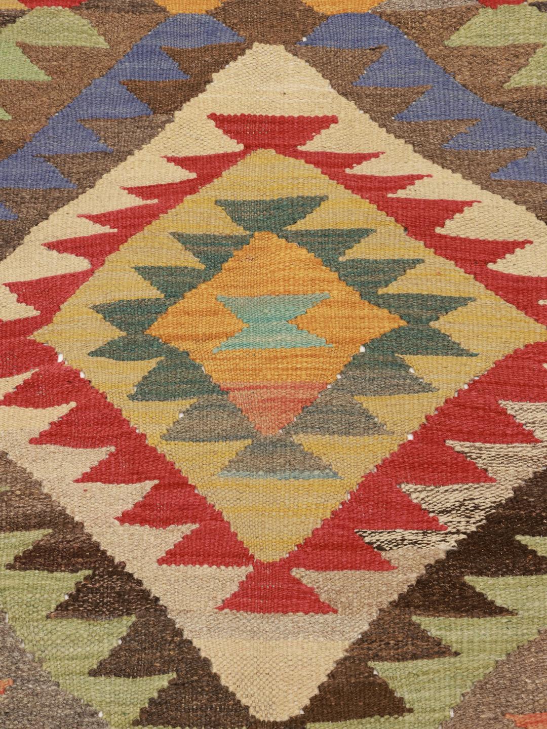 Hand-woven multicolor wool runner rug from Afghanistan with geometric patterns