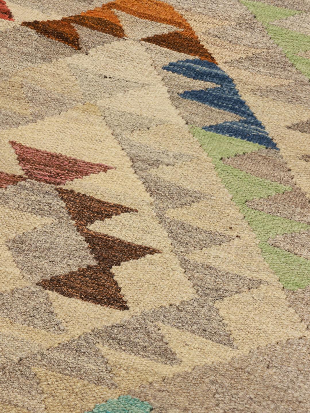 Hand-woven wool runner rug from Afghanistan in beige and multicolor