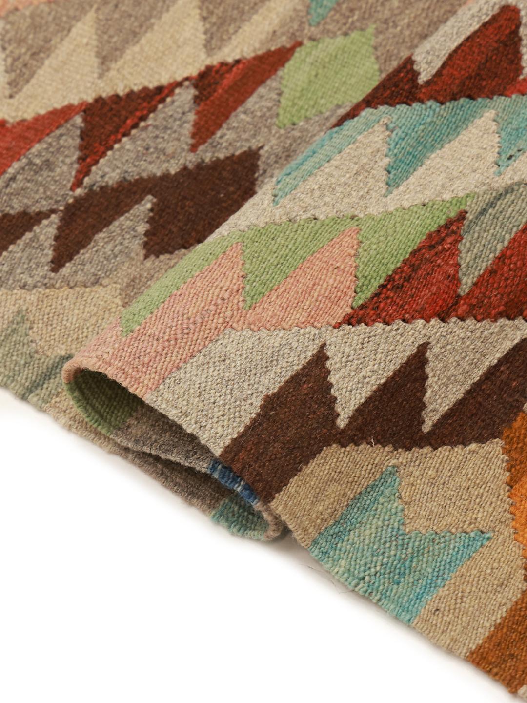 Hand-woven wool runner rug from Afghanistan in beige and multicolor