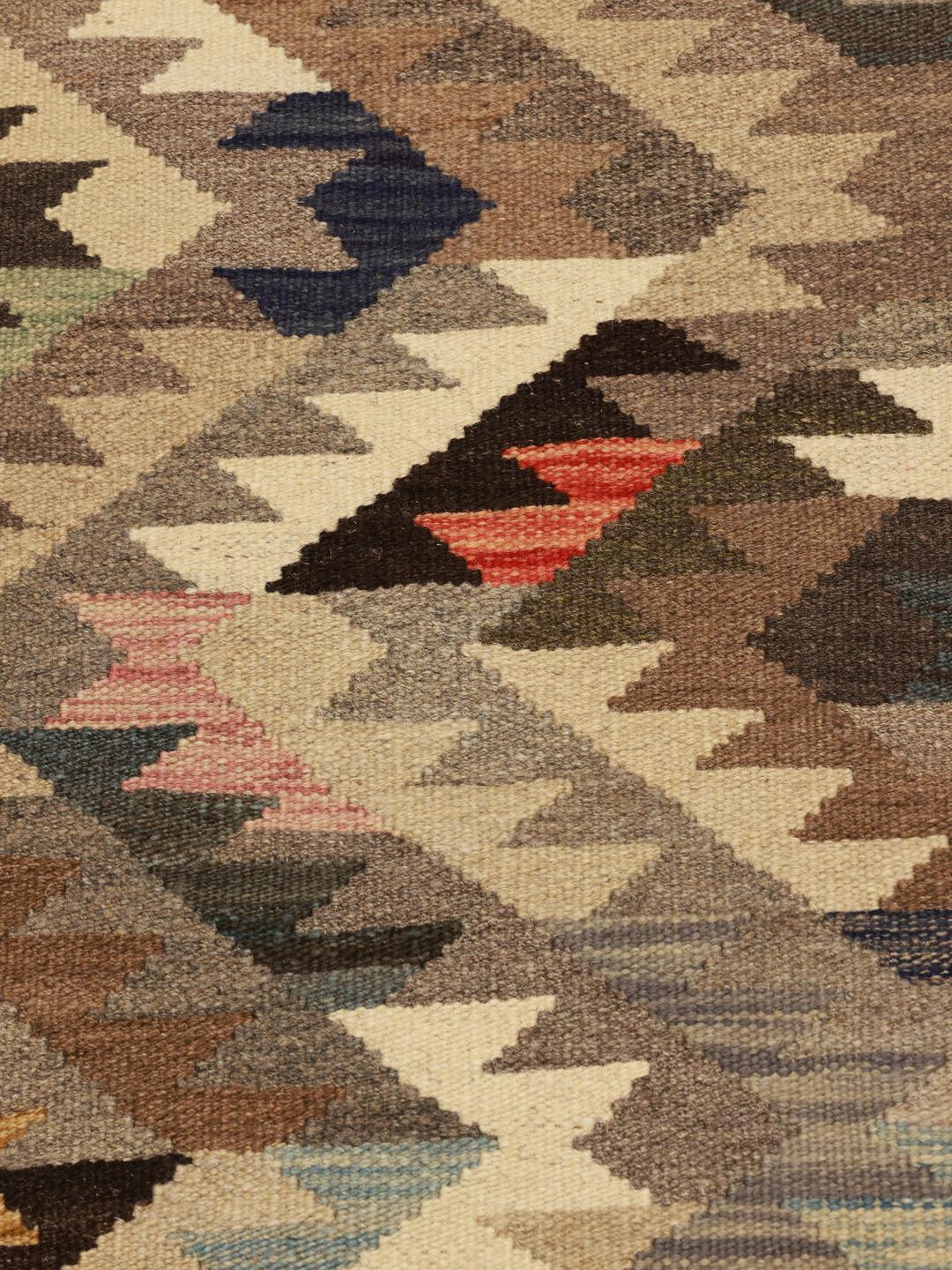 Handgeweven beige en bruine wollen loper uit Afghanistan
