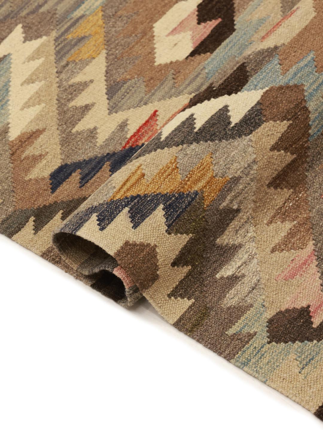 Handgeweven beige en bruine wollen loper uit Afghanistan