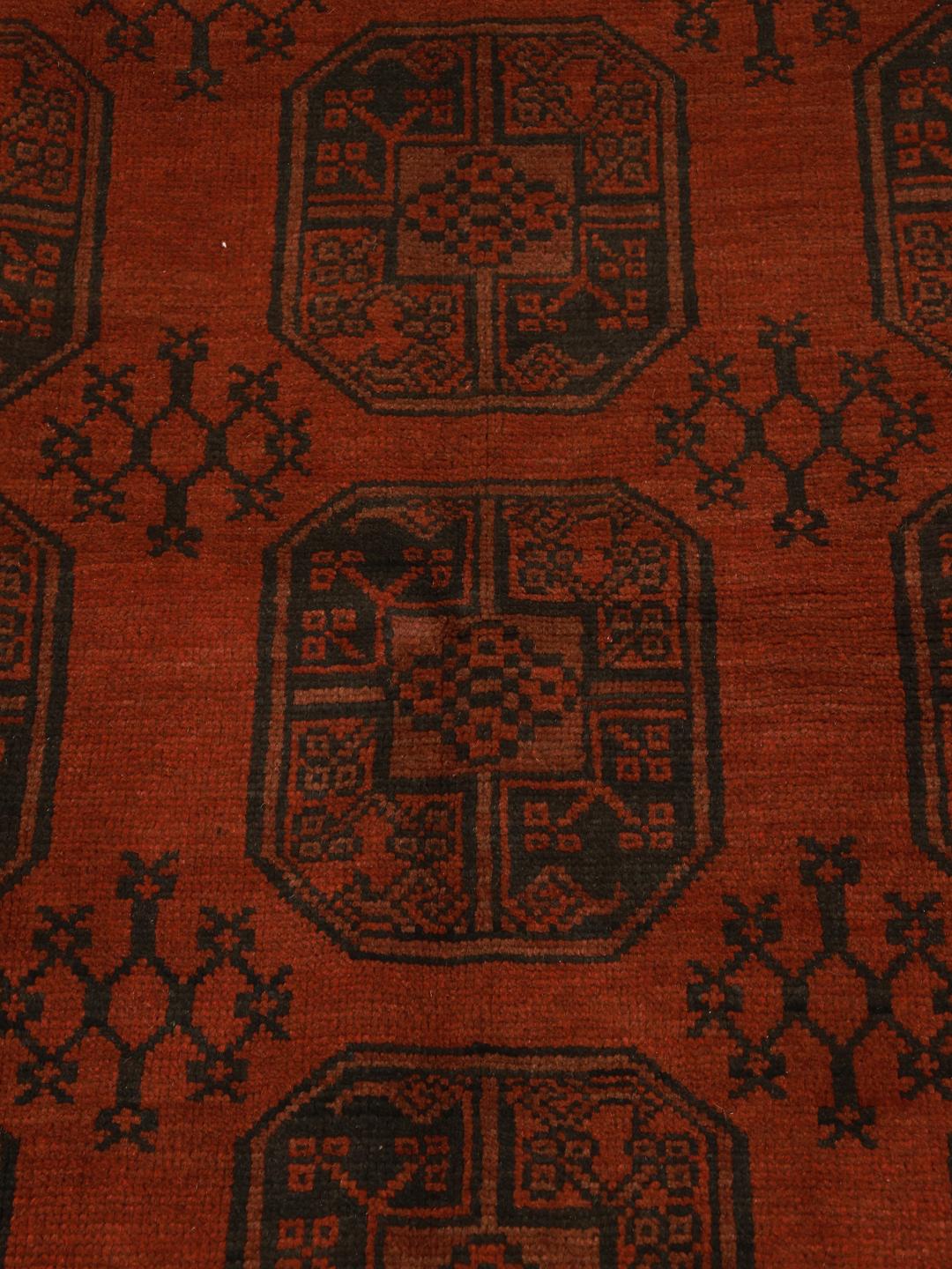 Hand-knotted Afghan Fine rug in dark-red and black