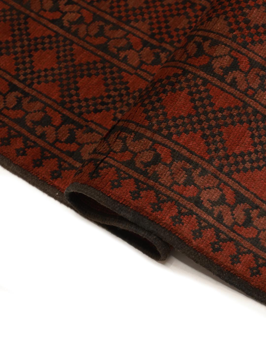 Hand-knotted Afghan Fine rug in dark-red and black