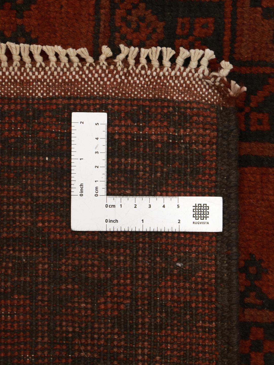 Hand-knotted Afghan Fine rug in dark-red and black
