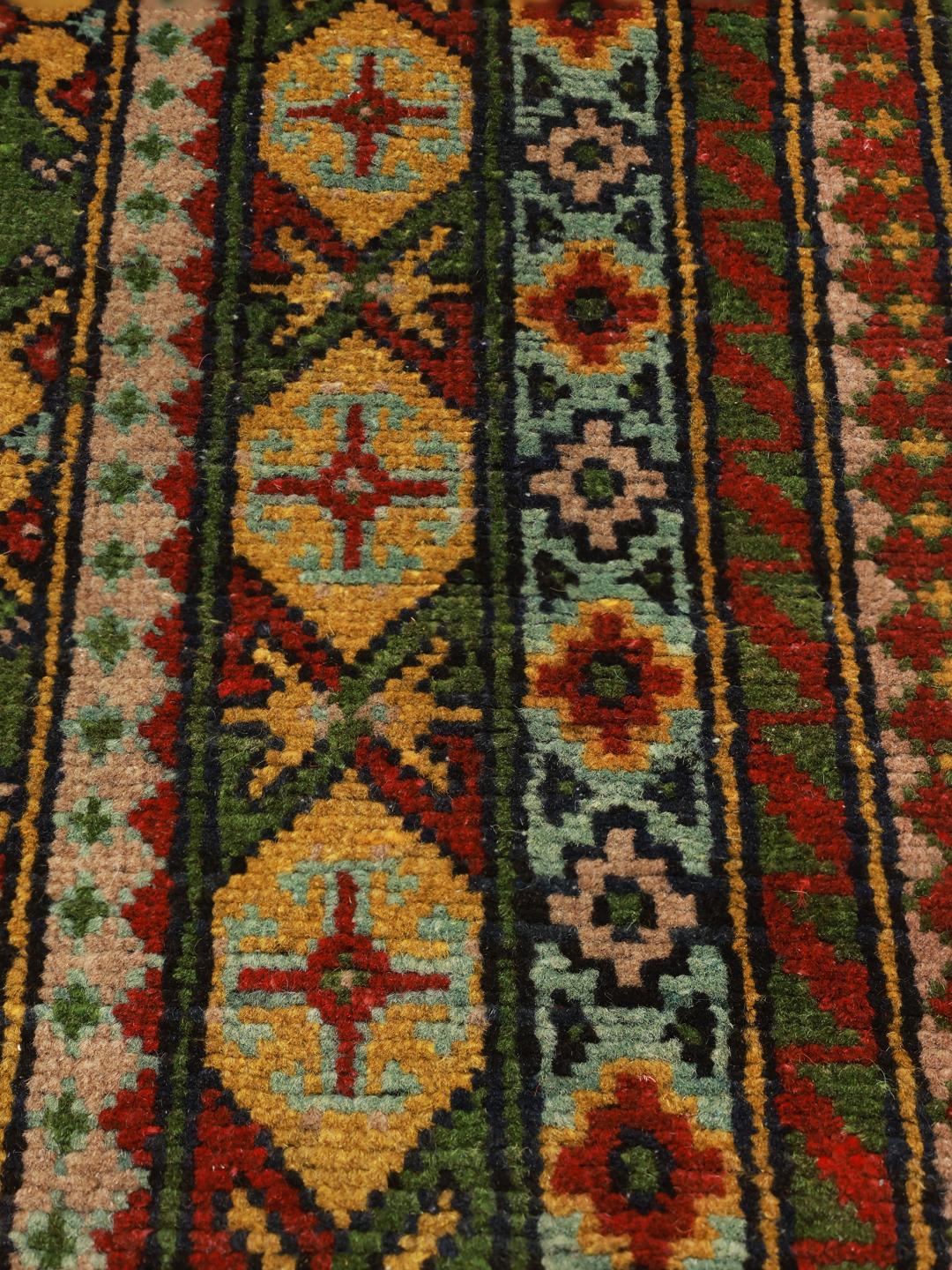 Hand-knotted Afghan Fine wool rug in green