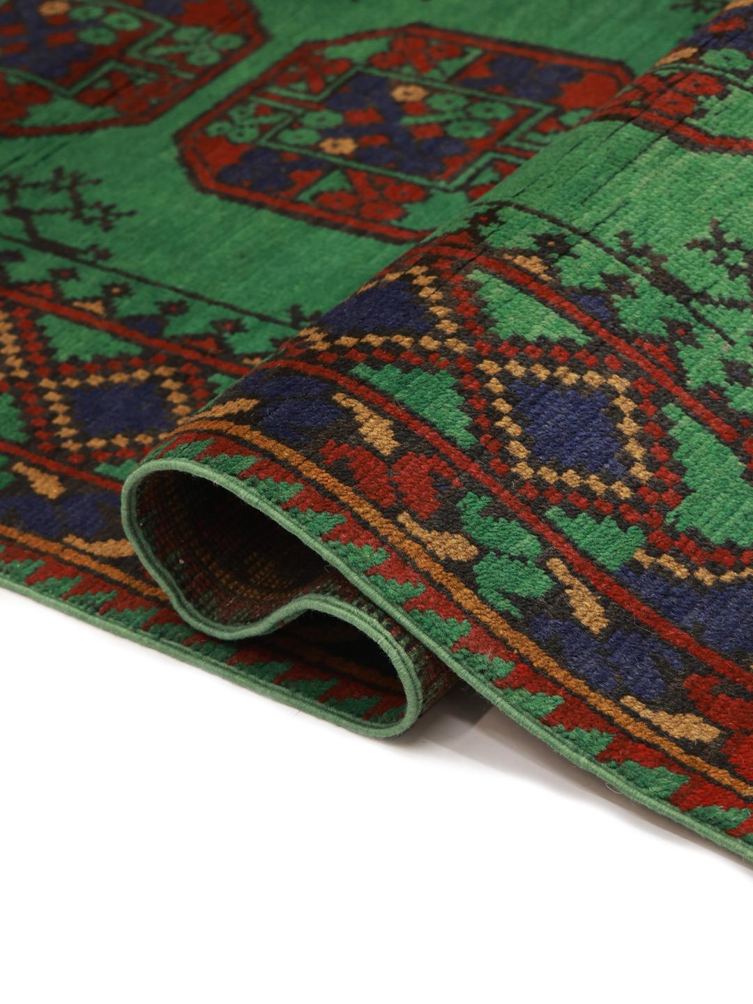 Hand-knotted wool rug from Afghanistan in green and red
