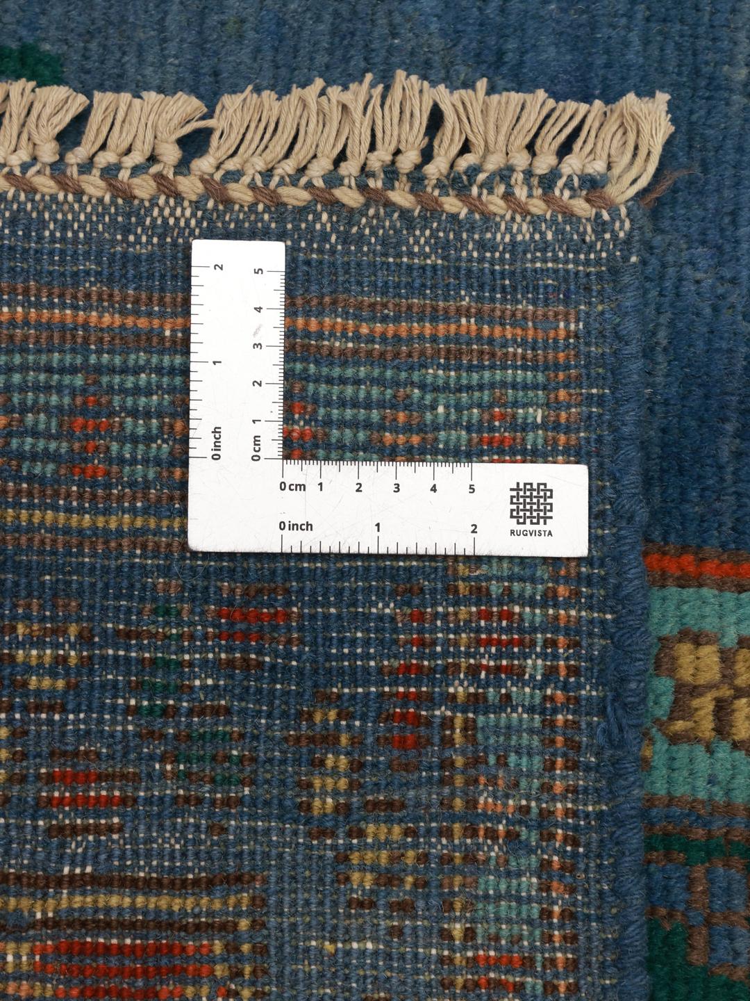 Handgeknoopt blauw vloerkleed uit Afghanistan met traditionele geometrische patronen