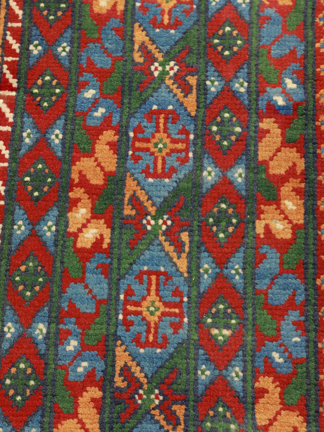 Handgeknoopt groen wollen vloerkleed uit Afghanistan