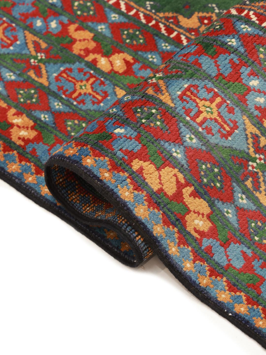 Handgeknoopt groen wollen vloerkleed uit Afghanistan