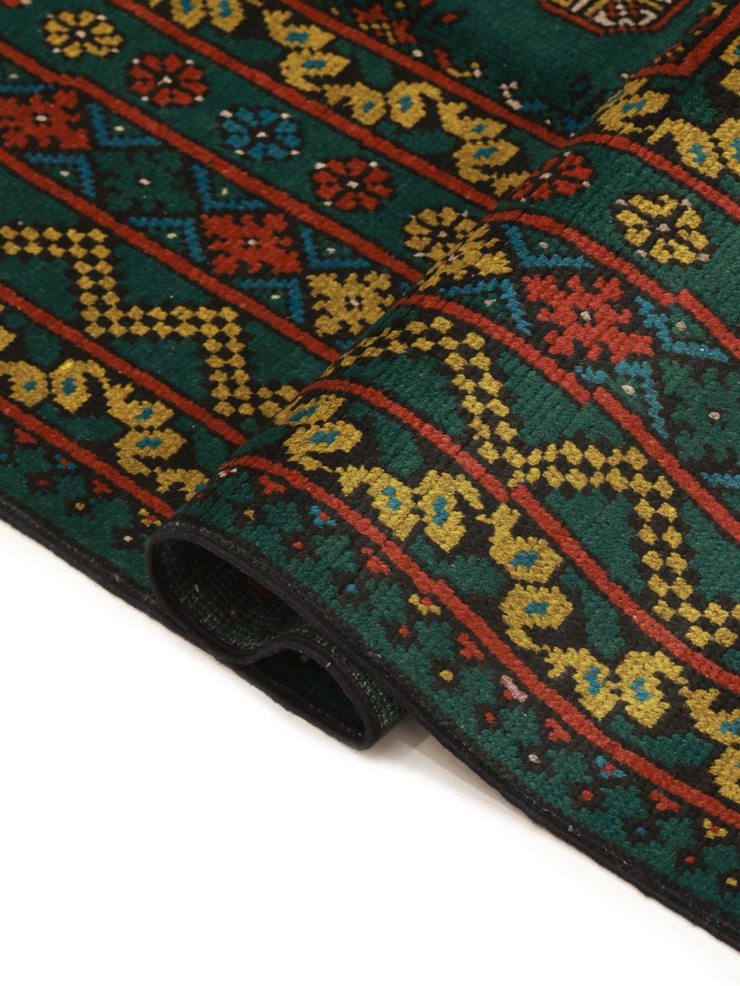 Handgeknoopt donkergroen wollen vloerkleed uit Afghanistan