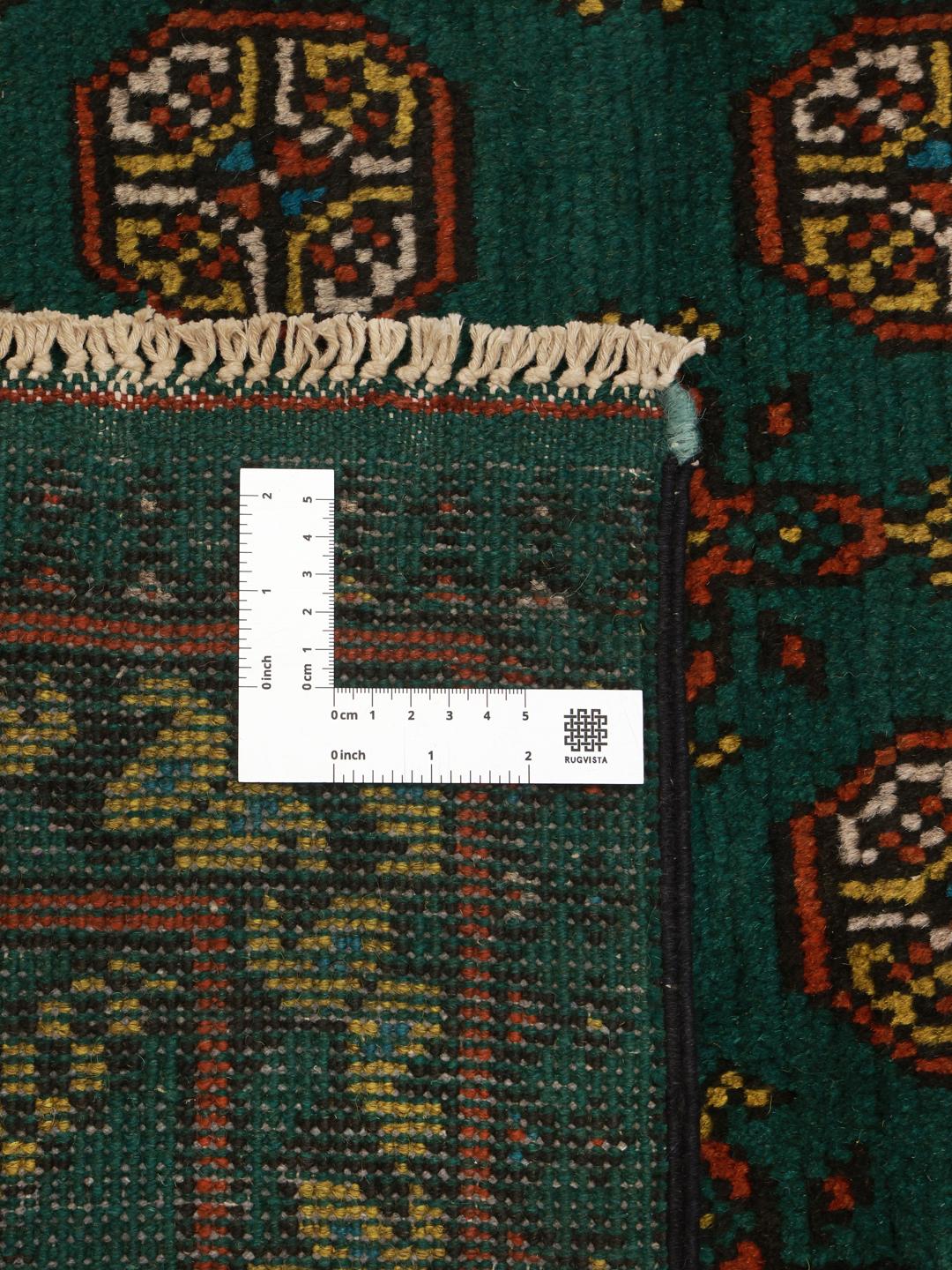 Handgeknoopt donkergroen wollen vloerkleed uit Afghanistan