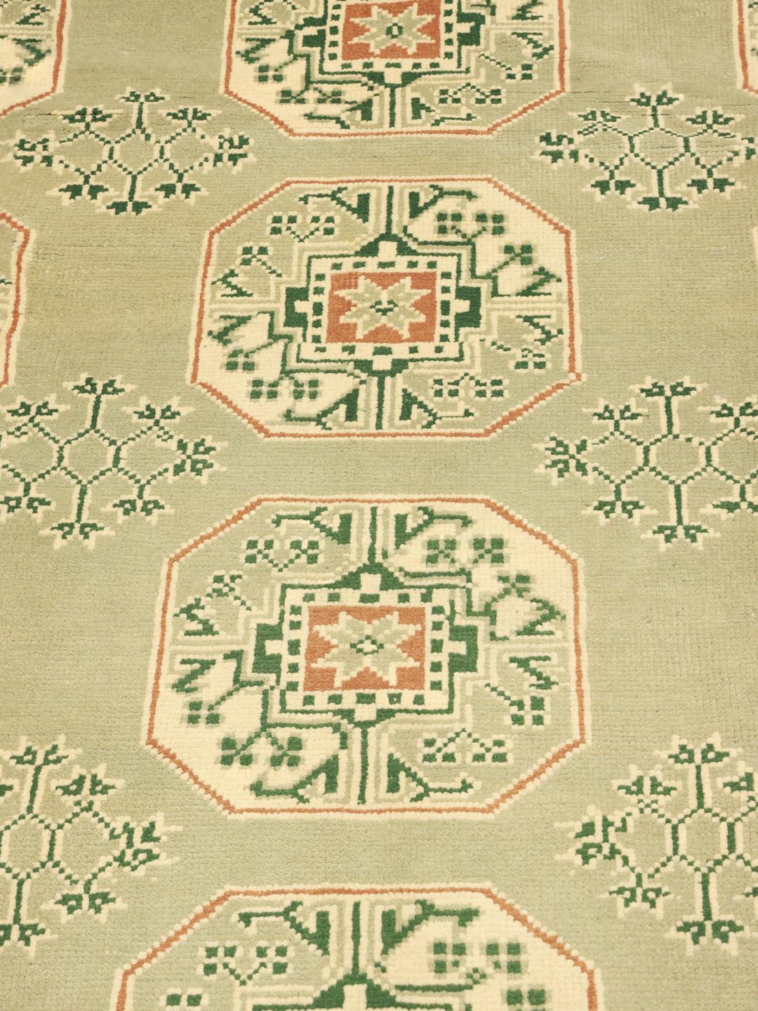 Hand-knotted Afghan Fine rug in light green and orange with geometric borders