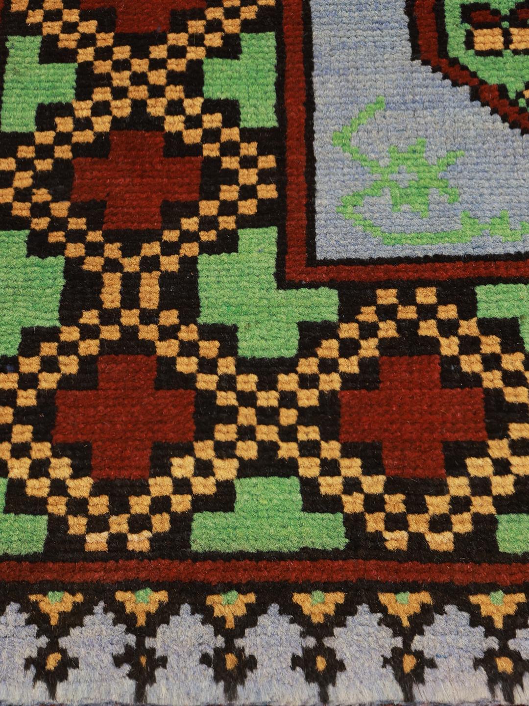 Hand-knotted Afghan Fine runner in light blue and dark red
