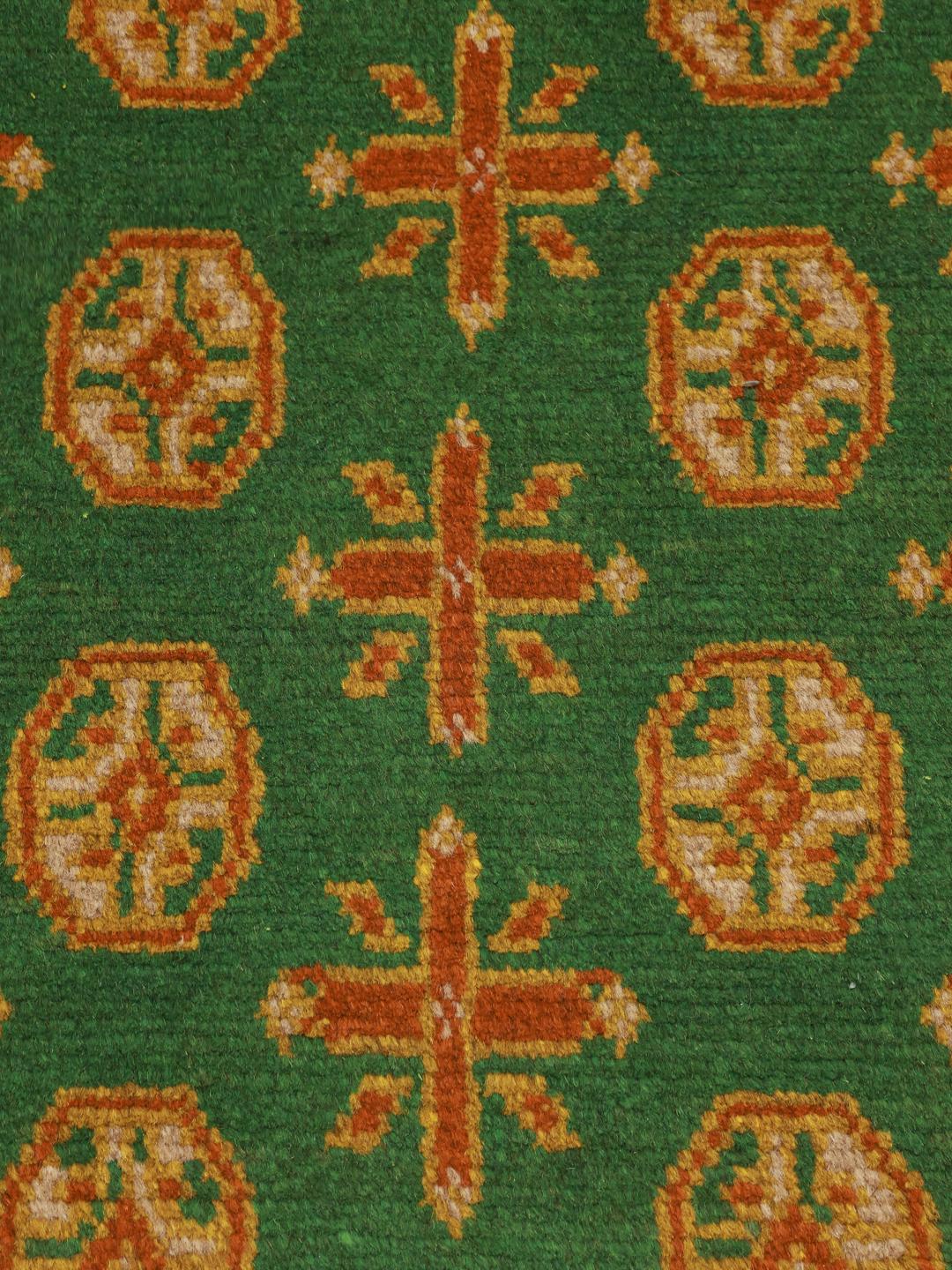 Hand-knotted green Afghan Fine runner rug with orange geometric patterns