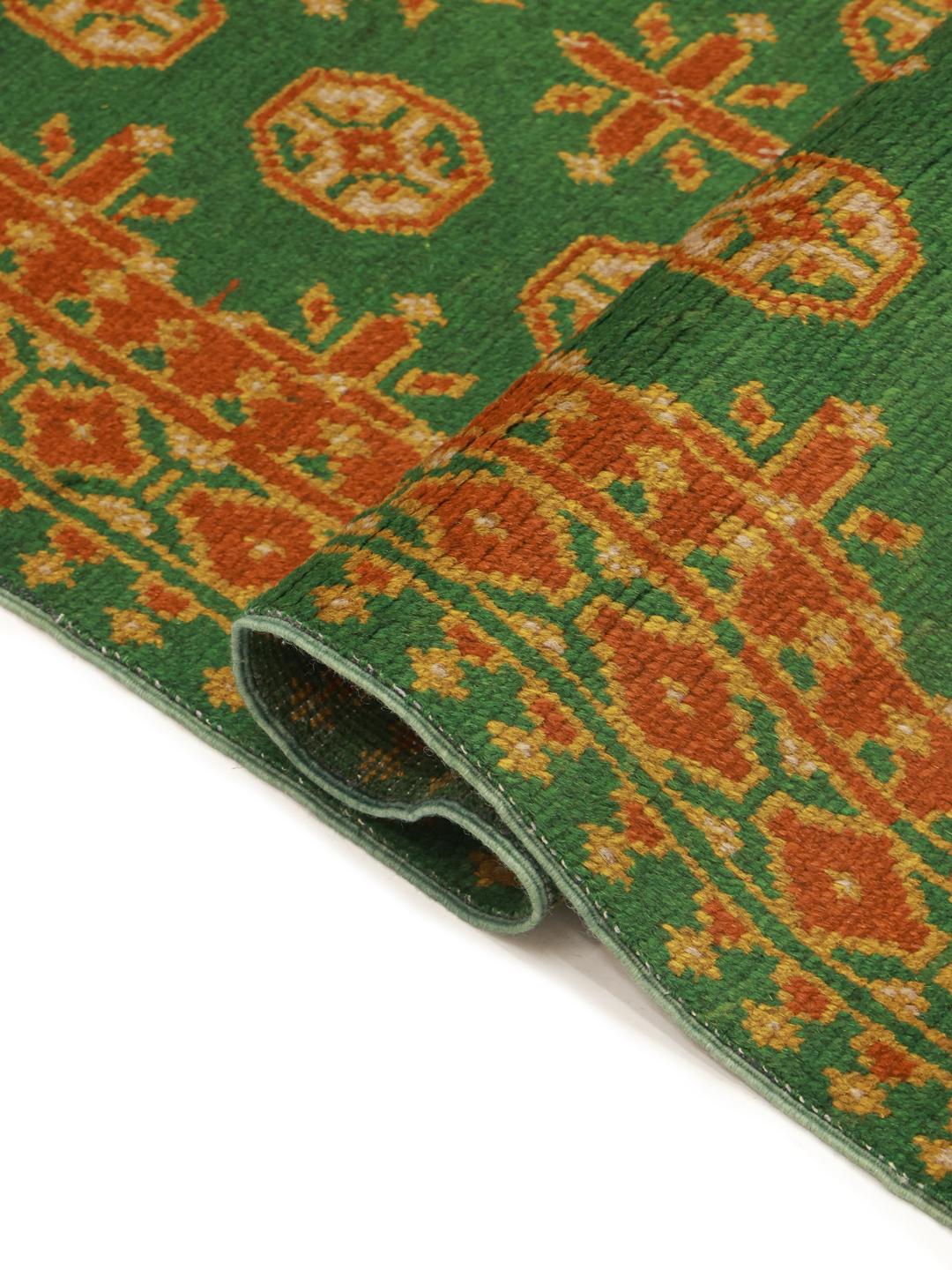 Hand-knotted green Afghan Fine runner rug with orange geometric patterns